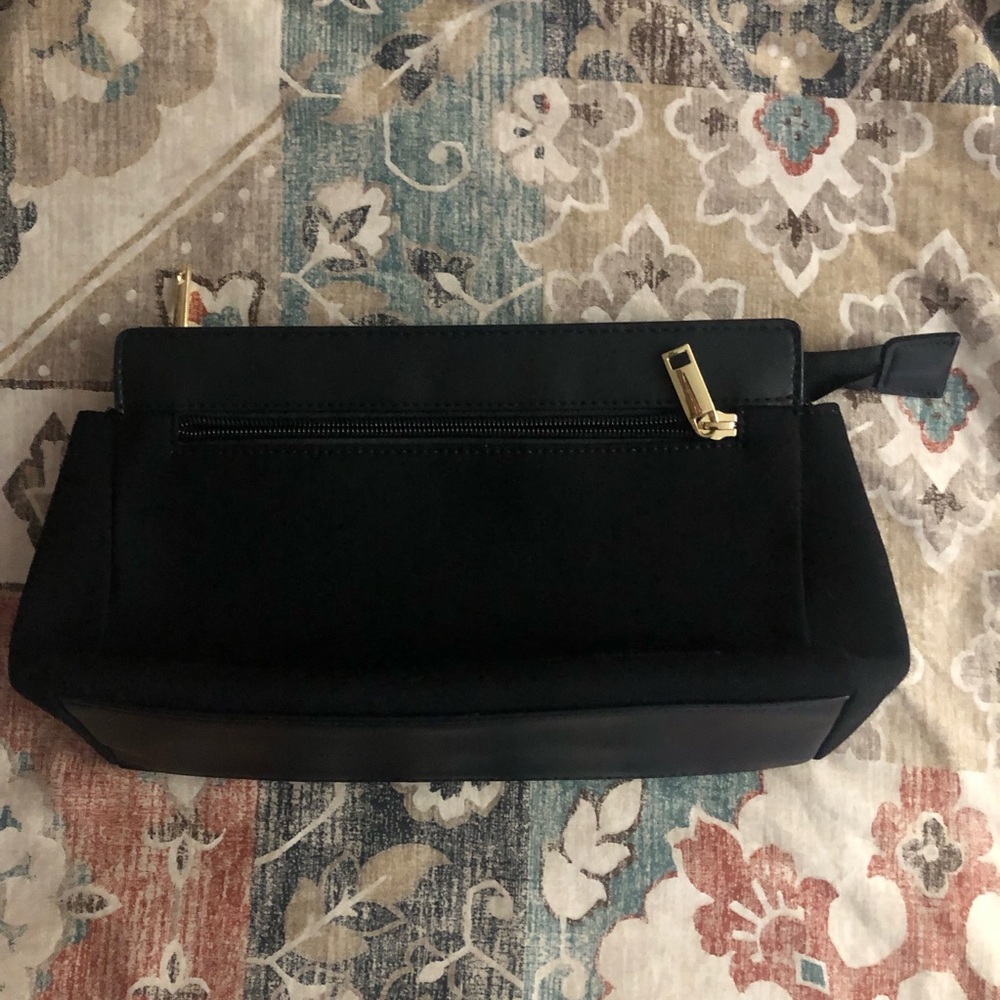 Chic Black Cosmetic Clutch with gold tone accent zipper